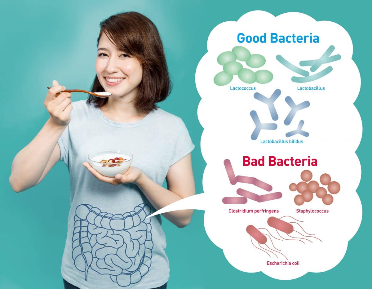 woman eating with gut health illustration